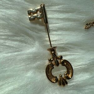 Vintage Avon gold tone key pin